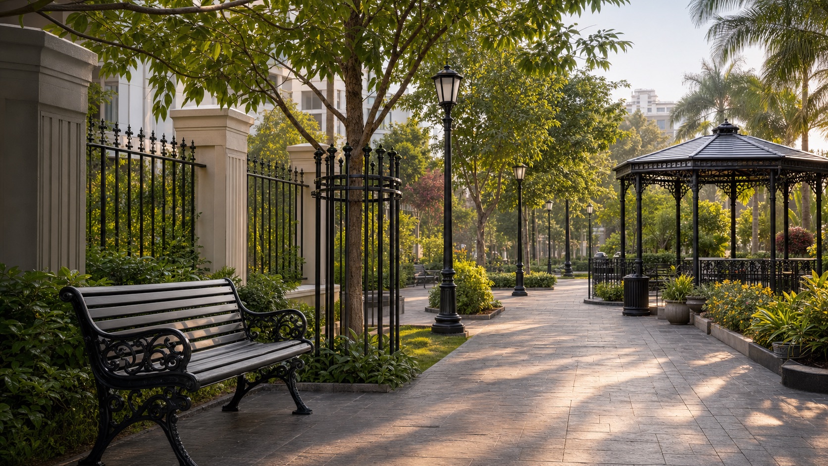 Cast iron benches, tree guards, lamp posts, railings and gazebo used across a landscaped outdoor project